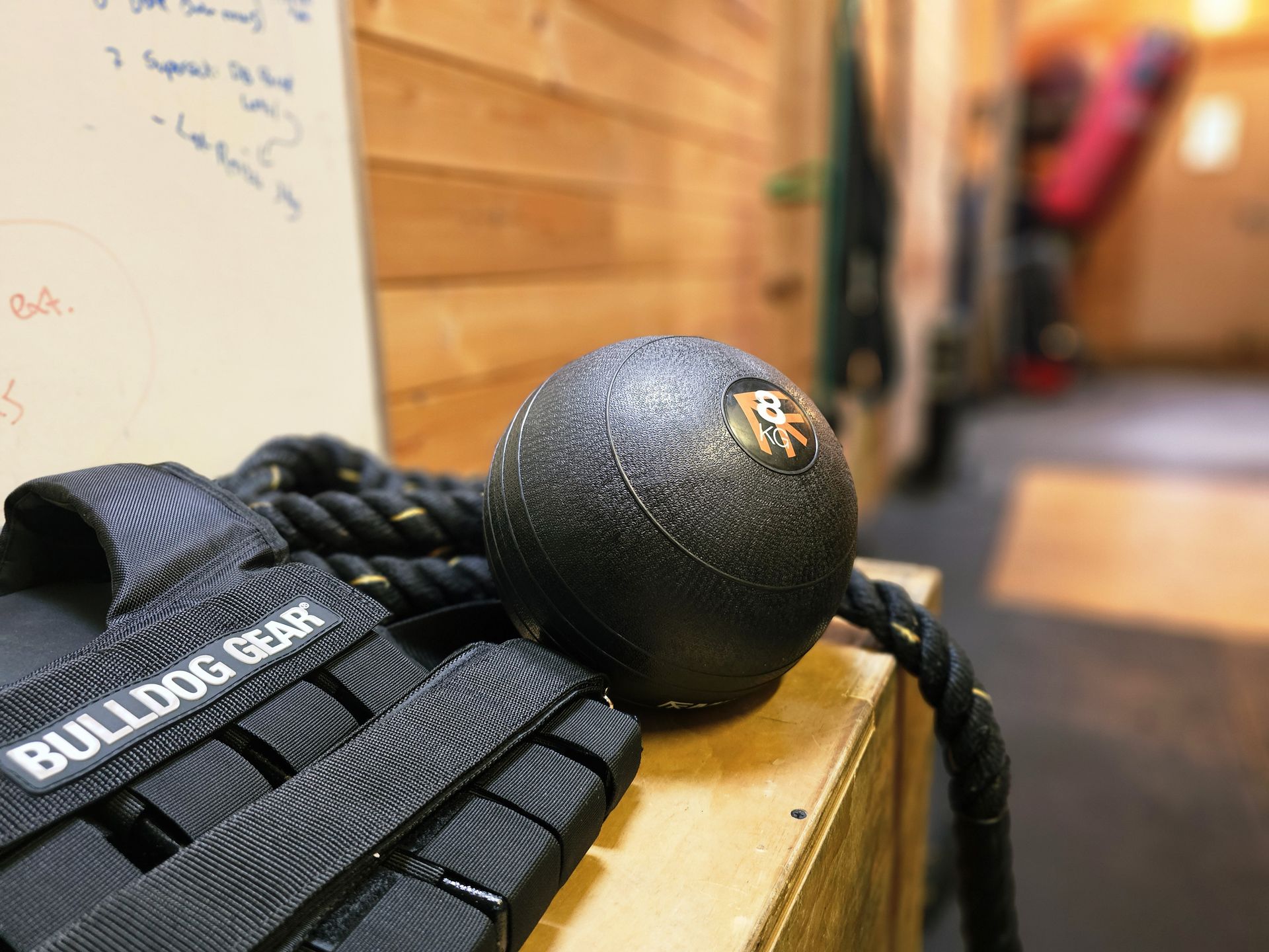 Slam ball, weighted vest and battle rope